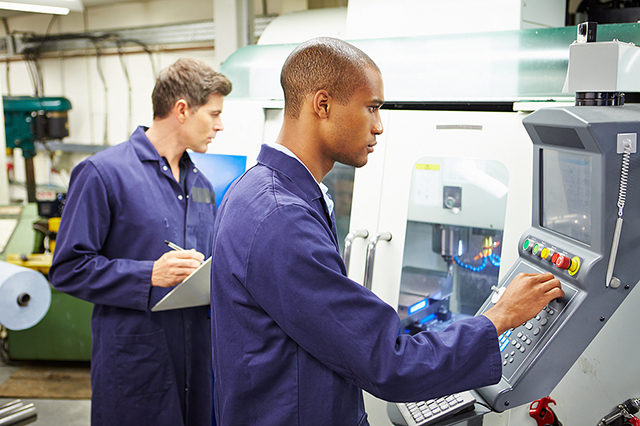Workers LEV Testing at CNC machine